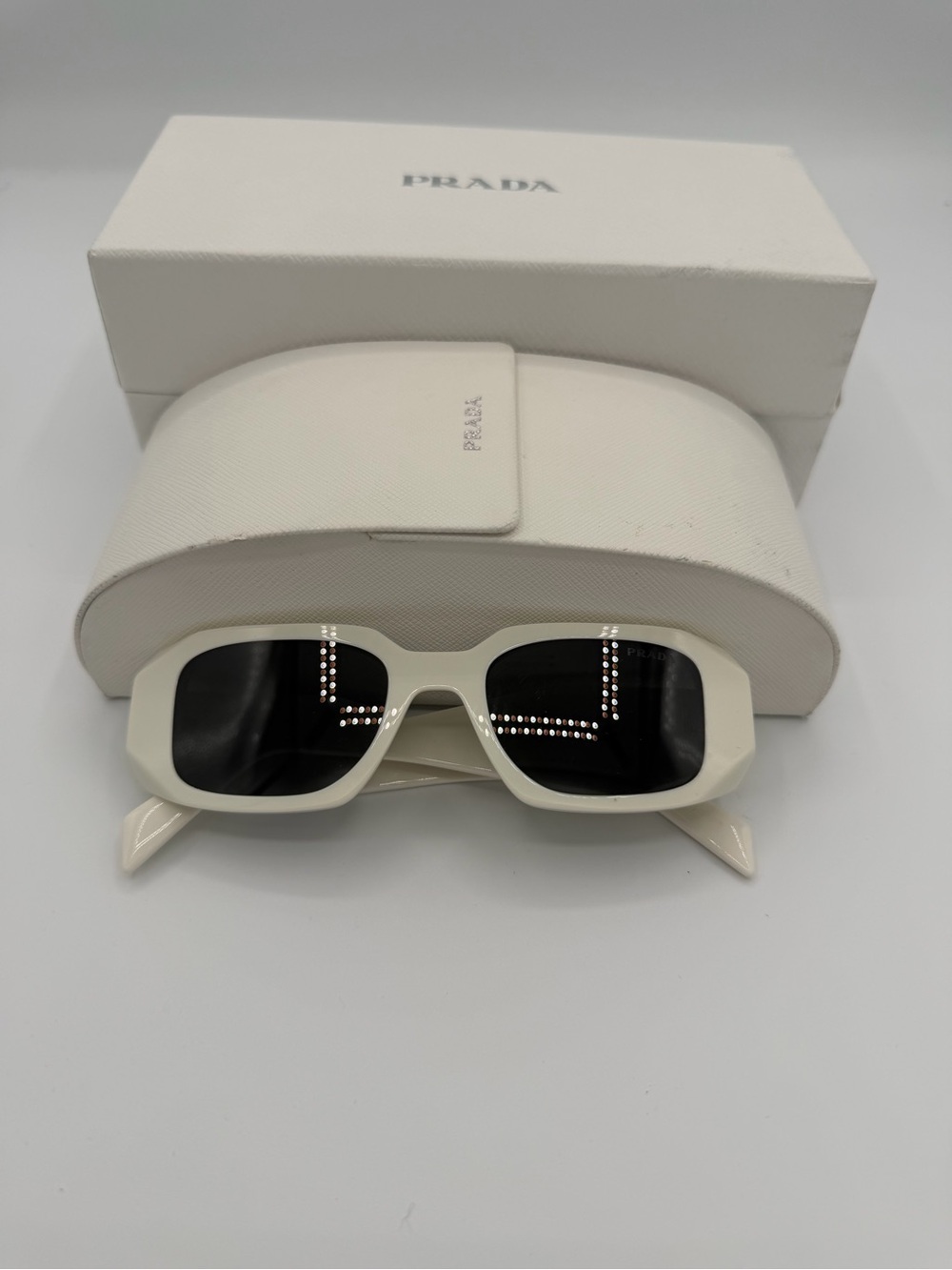 Prada SPR 17W Ivory White Rectangular Sunglasses Dark Lenses